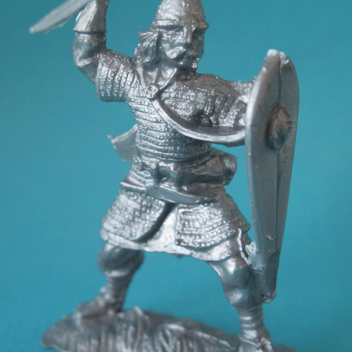 Saxon avec épée et bouclier oblong.