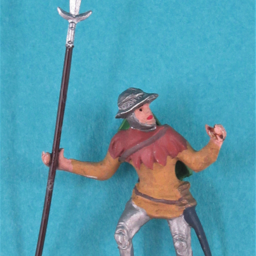 1207 Arbalétrier ou homme d'armes bras levés, bouclier sur le dos (1219).