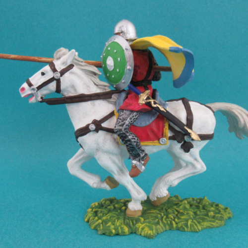 50944 Cavalier jouteur avec bouclier rond et cape (cheval au galop, deux jambes posées au sol).