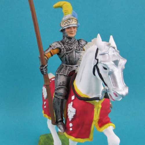 52040  Chevalier en armure sur cheval caparaçonné, avec lance, casque visière ouverte.