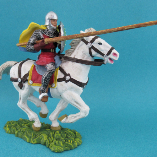 50944 Cavalier jouteur avec bouclier rond et cape (cheval au galop, deux jambes posées au sol).