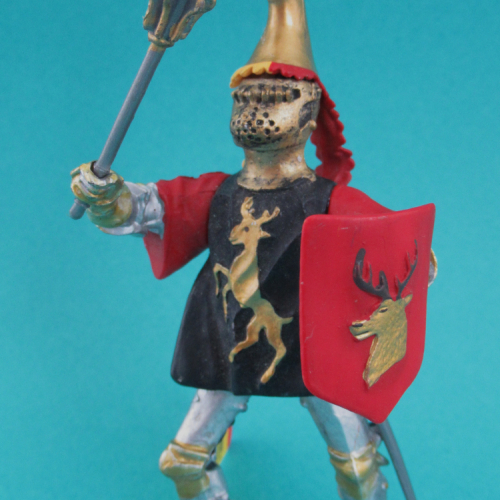 62037   Chevalier cimier Cerf et masse d'armes, noir et or.