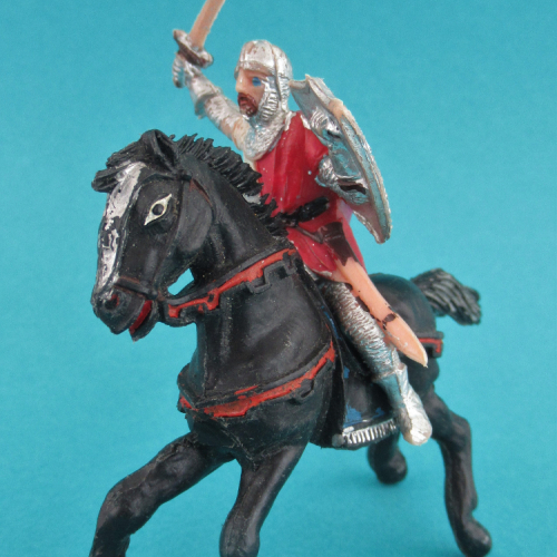 CR08 Cavalier avec cape, épée et bouclier levés (présenté comme El Cid).