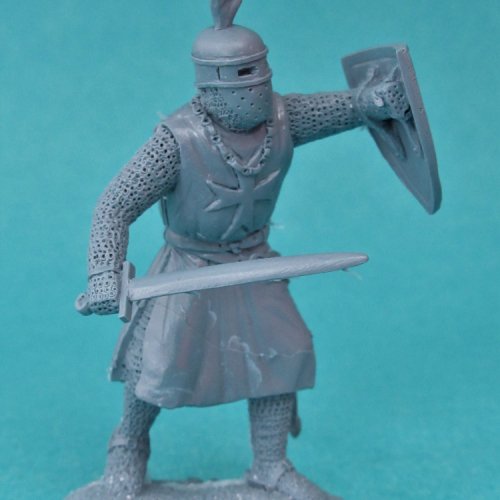 04. Chevalier avec épée , bouclier et casque surmonté d'une main.