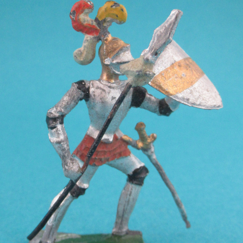 Chevalier au combat, casque à 3 plumets, visière fermé avec lance et écu barré.