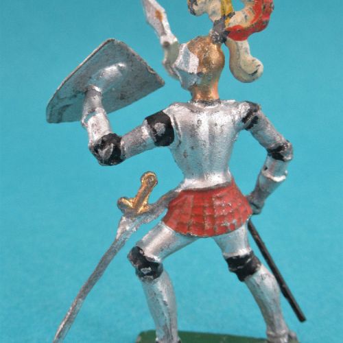 Chevalier au combat, casque à 3 plumets, visière fermé avec lance et écu barré.