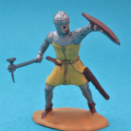 1236  Chevalier se défendant bras droit abaissé, bras gauche levé avec bouclier.
