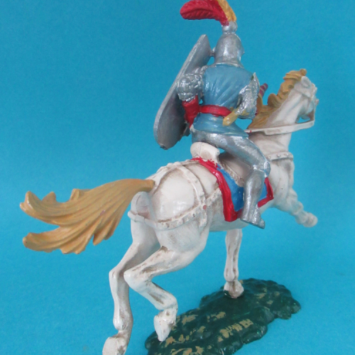 Figurine N°4 "Cody March" sur cheval Elastolin.