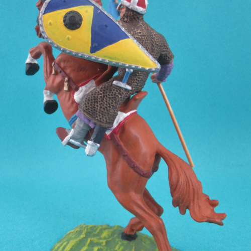 51048 Cavalier normand sur cheval cabré, portant lance et bouclier oblong.