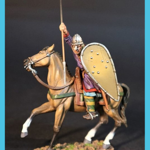 NM057     Cavalier breton avec lance et bouclier, bras droit frappant en bas à gauche.