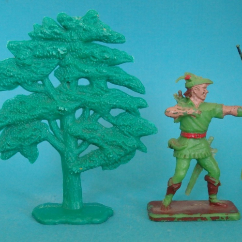 Comparaison entre un arbre décors « Crescent Toys » et Robin Hood.