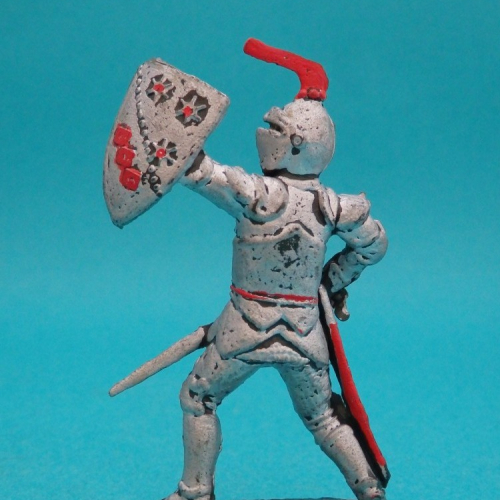 1. Chevalier avec épée et bouclier levé.