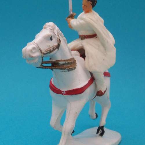 6. Thibaud avec épée brandie à deux mains à cheval.