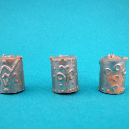 Face de 3 heaumes cylindriques.