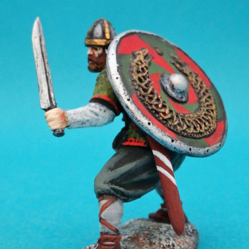 Viking avec deux épées et bouclier.