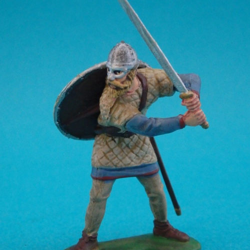 4. Viking avec épée et bouclier sur le dos.