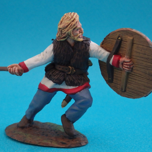 14. Viking nu tête avec hache et bouclier.