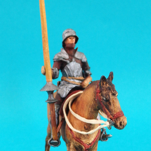 Homme d'armes à cheval avec lance.