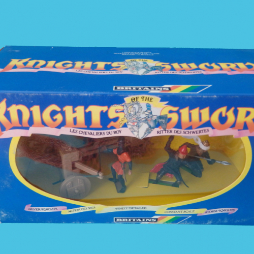 7786  Boxed set contenant 2 chevaliers Black Knights à pied, 2 servants et 1 baliste.