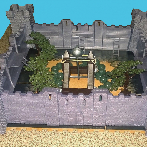 Château-fort, catapulte et décors.